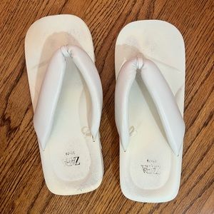 White Zara flat form flip flops
